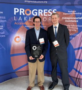 Seth Zipperer from CLA presented Dramm Corporation with Honorable Mention in Corporate Investment.